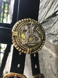 Pair of large Brass Rosettes with Silver (or Brass) Dragon, Fancy border.