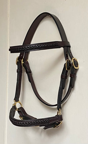 Inlaid plait bitless filly slip.