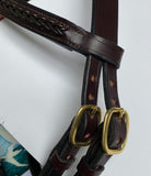 Inlaid plait bitless filly slip.